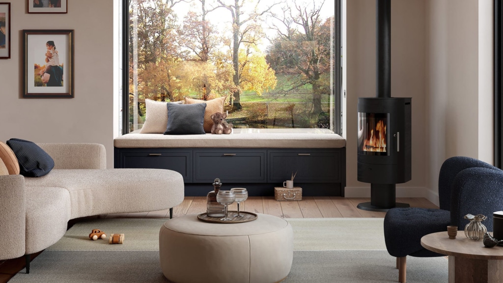 The Arrington in a living area featuring dark blue drawers with a marble wortktop, slotting in nicely alongside a window to create a window seat.