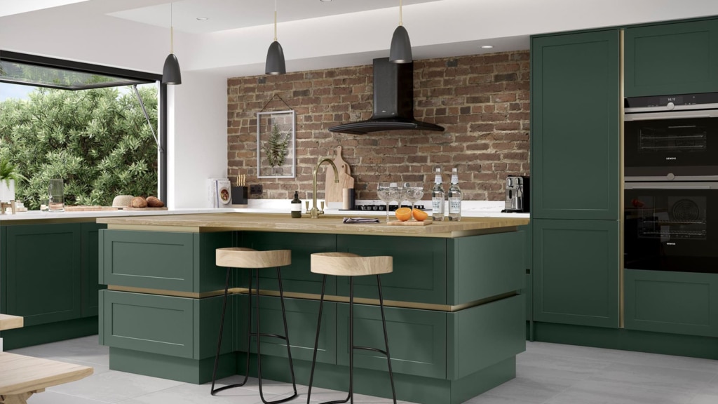 The Clifden kitchen range in heritage green with oak worktops.