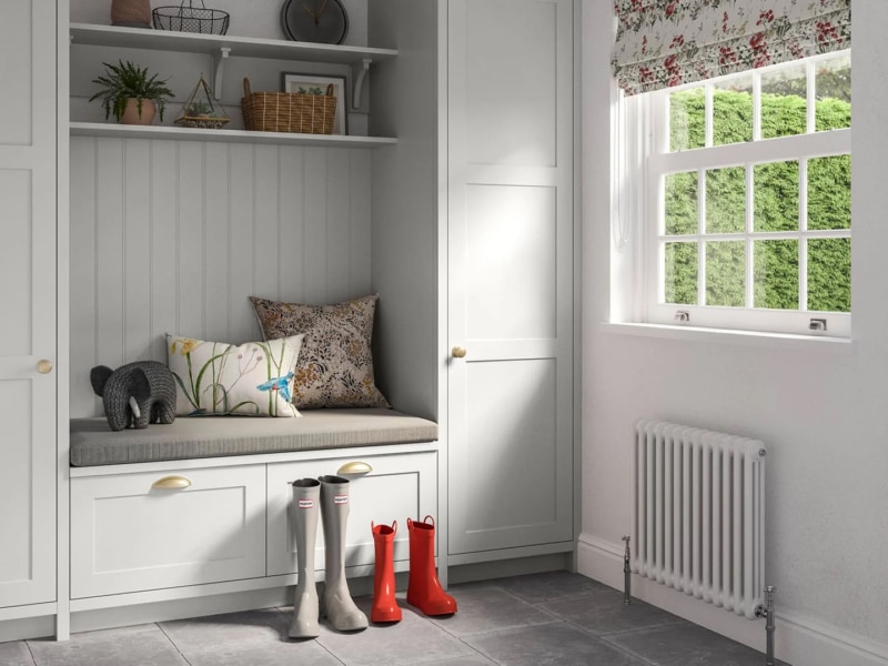 A light grey stori in a boot room.